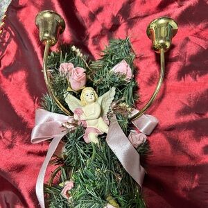 Beautiful vintage Victorian Candle sconce decorated with an angel- and greenery